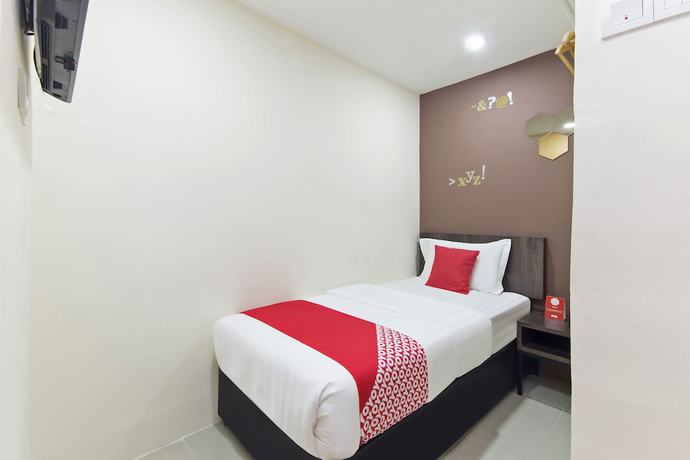 Imagen de la habitación del Hotel Super OYO 326 Tc Hotel. Foto 1