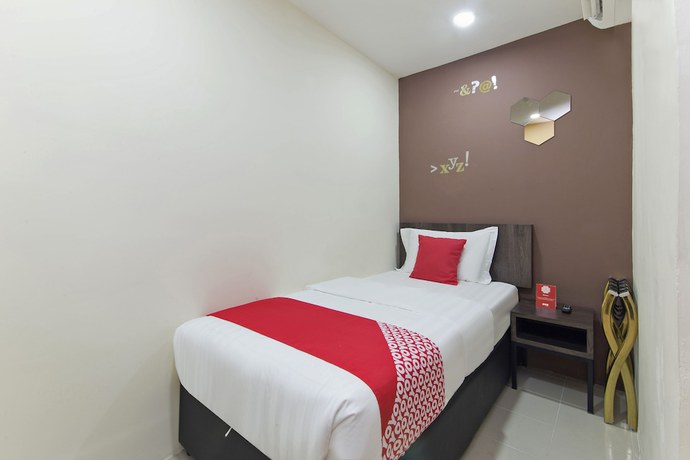 Imagen de la habitación del Hotel Super OYO 326 Tc Hotel. Foto 2