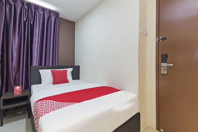 Imagen de la habitación del Hotel Super OYO 326 Tc Hotel. Foto 11