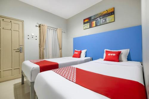 Imagen de la habitación del Hotel Super OYO 3846 Rumah Prambanan. Foto 20