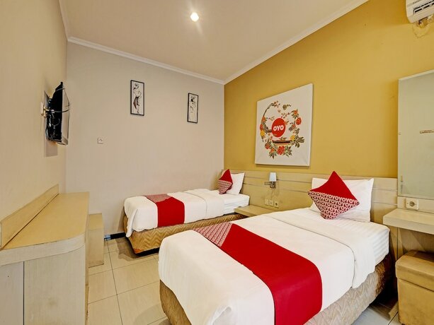 Imagen de la habitación del Hotel Super OYO 389 Sky Guesthouse. Foto 13