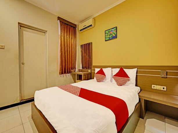 Imagen de la habitación del Hotel Super OYO 389 Sky Guesthouse. Foto 15