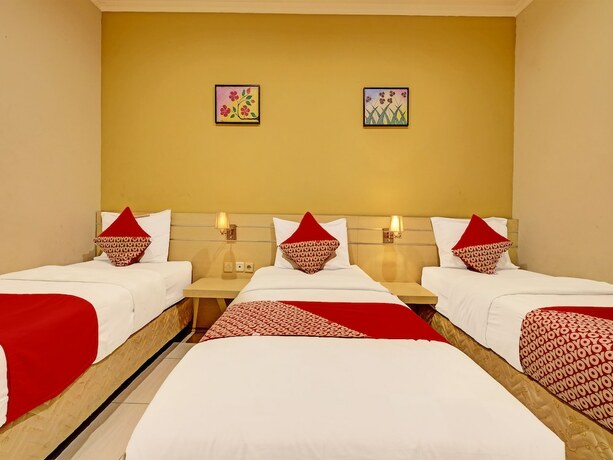 Imagen de la habitación del Hotel Super OYO 389 Sky Guesthouse. Foto 17