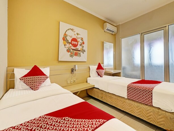 Imagen de la habitación del Hotel Super OYO 389 Sky Guesthouse. Foto 18