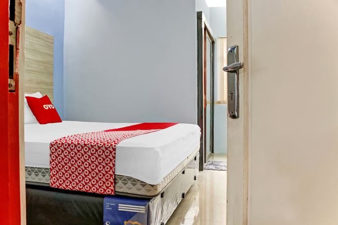 Imagen de la habitación del Hotel Super OYO 3903 Sweethome Syariah Guesthouse. Foto 4