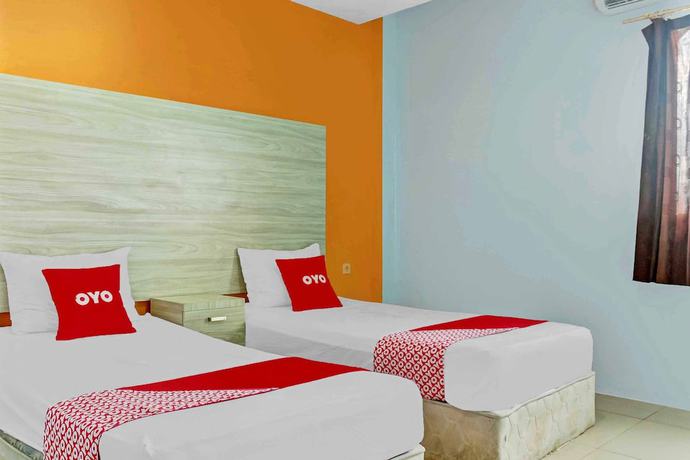 Imagen de la habitación del Hotel Super OYO 3903 Sweethome Syariah Guesthouse. Foto 5