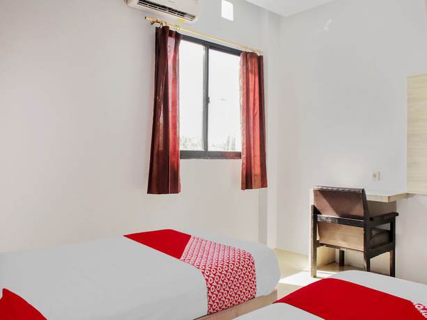 Imagen de la habitación del Hotel Super OYO 3903 Sweethome Syariah Guesthouse. Foto 8
