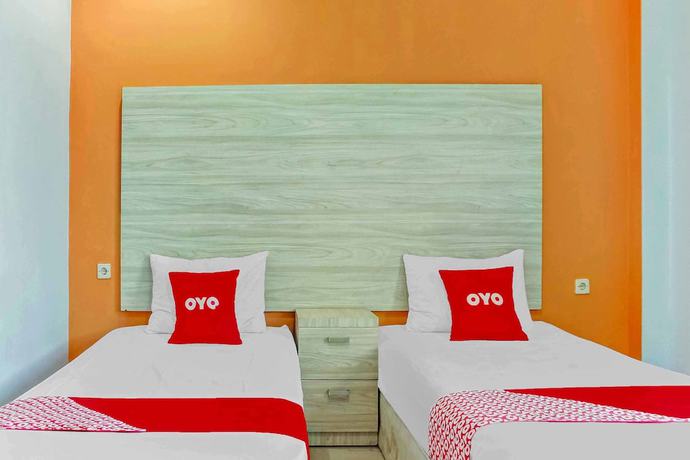 Imagen de la habitación del Hotel Super OYO 3903 Sweethome Syariah Guesthouse. Foto 9