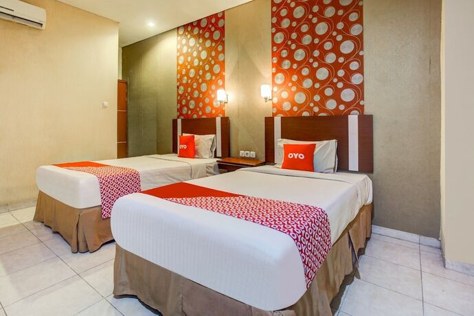Imagen de la habitación del Hotel Super OYO 3936 Trisula Makassar. Foto 15