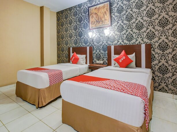 Imagen de la habitación del Hotel Super OYO 3936 Trisula Makassar. Foto 17