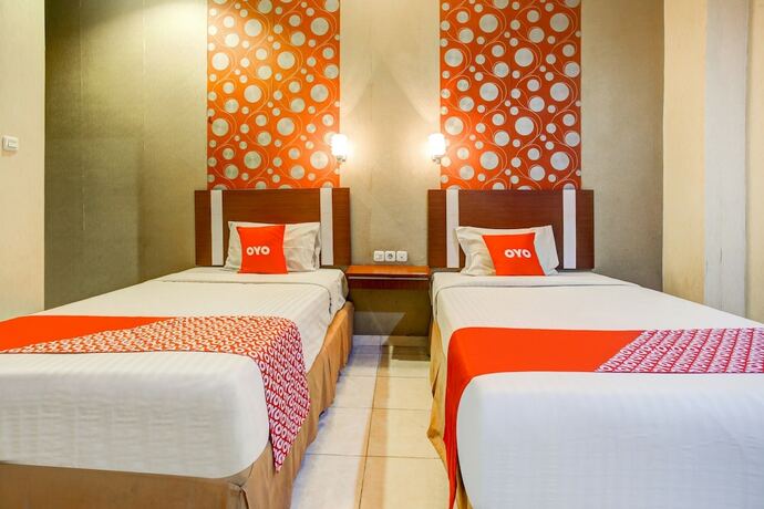Imagen de la habitación del Hotel Super OYO 3936 Trisula Makassar. Foto 19