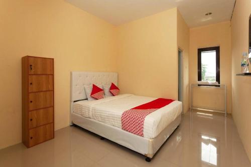 Imagen general del Hotel Super OYO 588 Richmond Guest House. Foto 2