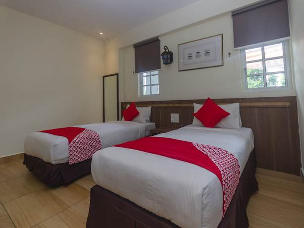 Imagen de la habitación del Hotel Super OYO 596 The Vintage. Foto 2