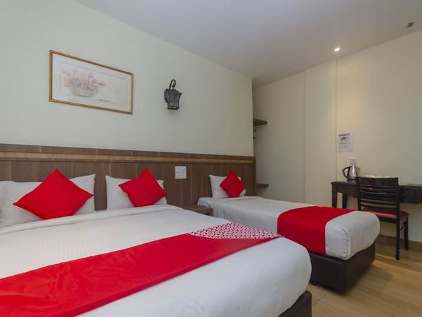 Imagen de la habitación del Hotel Super OYO 596 The Vintage. Foto 3