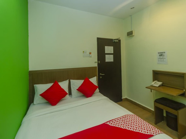 Imagen de la habitación del Hotel Super OYO 596 The Vintage. Foto 6