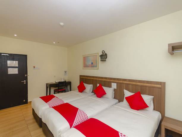 Imagen de la habitación del Hotel Super OYO 596 The Vintage. Foto 7