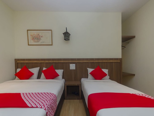 Imagen de la habitación del Hotel Super OYO 596 The Vintage. Foto 8