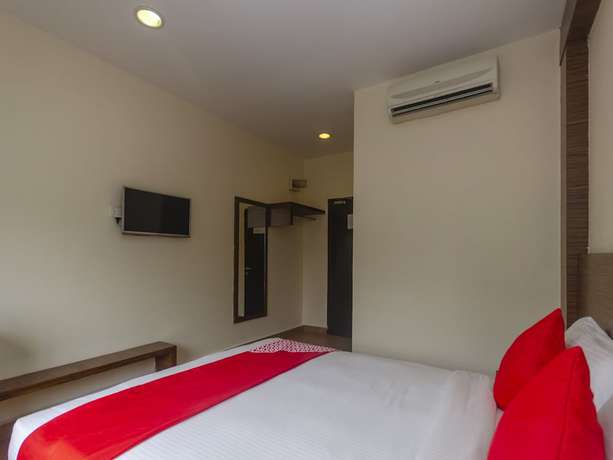 Imagen de la habitación del Hotel Super OYO 596 The Vintage. Foto 10