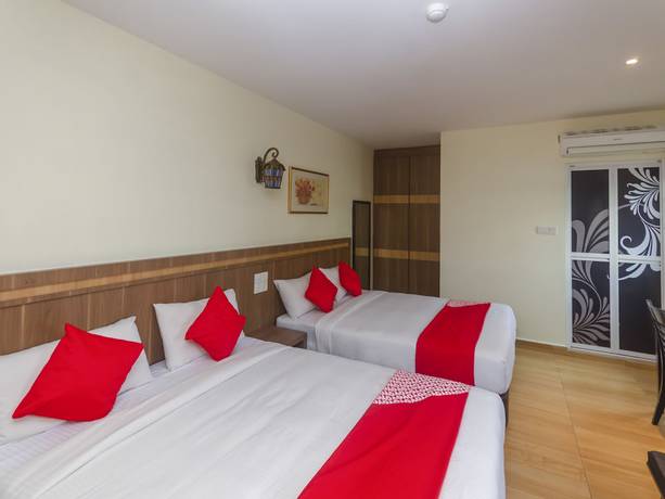 Imagen de la habitación del Hotel Super OYO 596 The Vintage. Foto 11