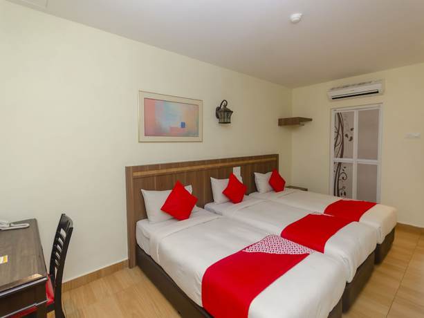 Imagen de la habitación del Hotel Super OYO 596 The Vintage. Foto 14