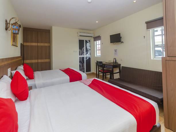 Imagen de la habitación del Hotel Super OYO 596 The Vintage. Foto 15