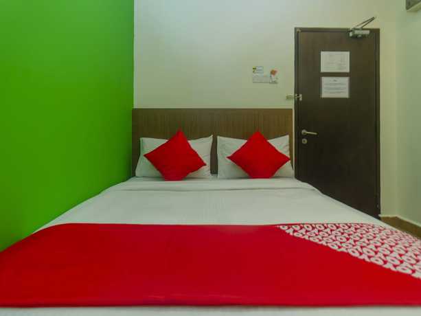 Imagen de la habitación del Hotel Super OYO 596 The Vintage. Foto 16