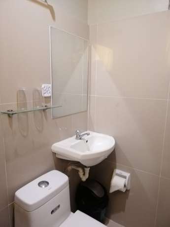 Imagen de la habitación del Hotel Super OYO 604 Chateau Cinco Dormitel - Hostel. Foto 4