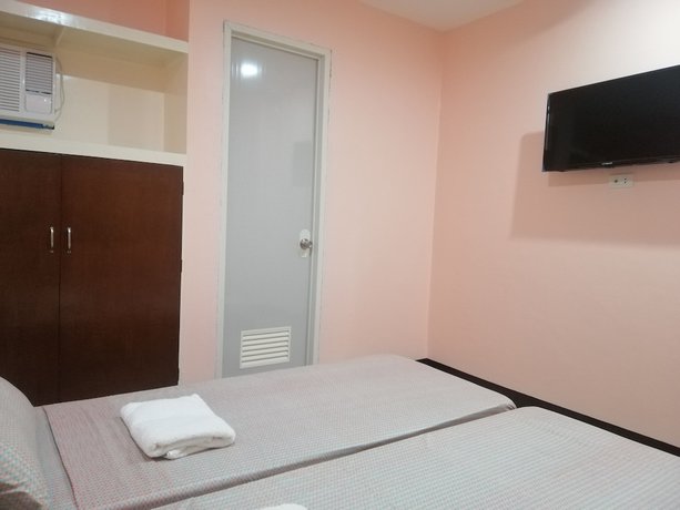 Imagen de la habitación del Hotel Super OYO 604 Chateau Cinco Dormitel - Hostel. Foto 8