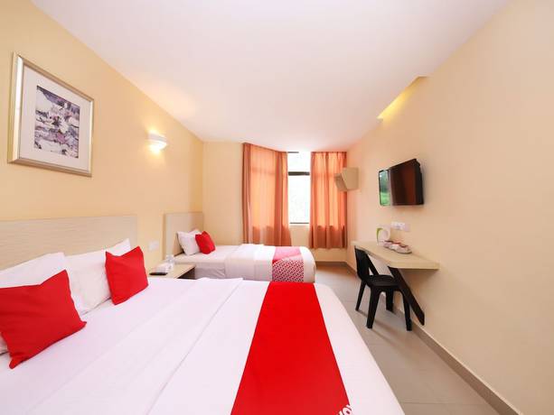 Imagen de la habitación del Hotel Super OYO 635 Seven Days. Foto 4