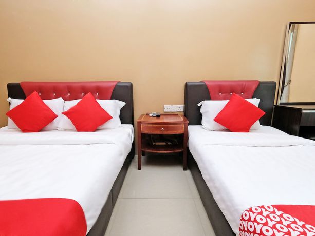 Imagen de la habitación del Hotel Super OYO 707 Ayuni. Foto 2