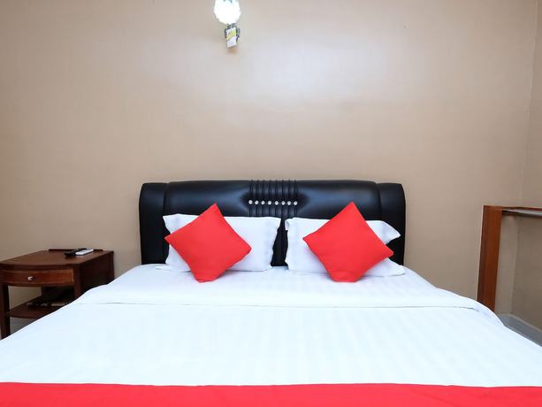 Imagen de la habitación del Hotel Super OYO 707 Ayuni. Foto 4