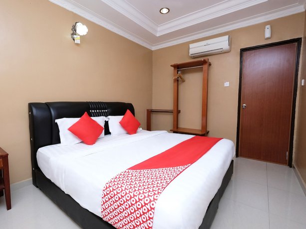 Imagen de la habitación del Hotel Super OYO 707 Ayuni. Foto 5