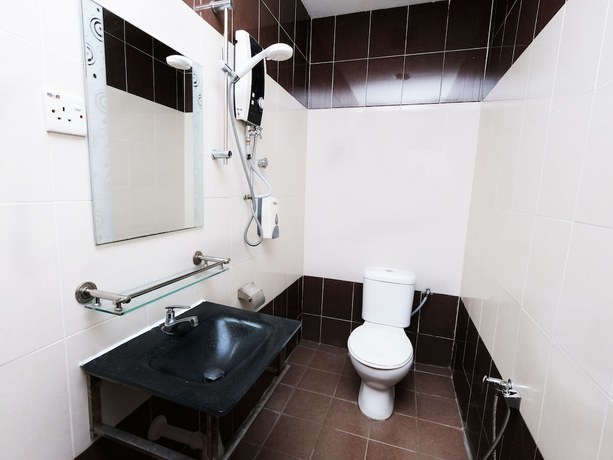Imagen de la habitación del Hotel Super OYO 707 Ayuni. Foto 6