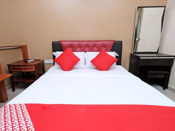 Imagen de la habitación del Hotel Super OYO 707 Ayuni. Foto 7