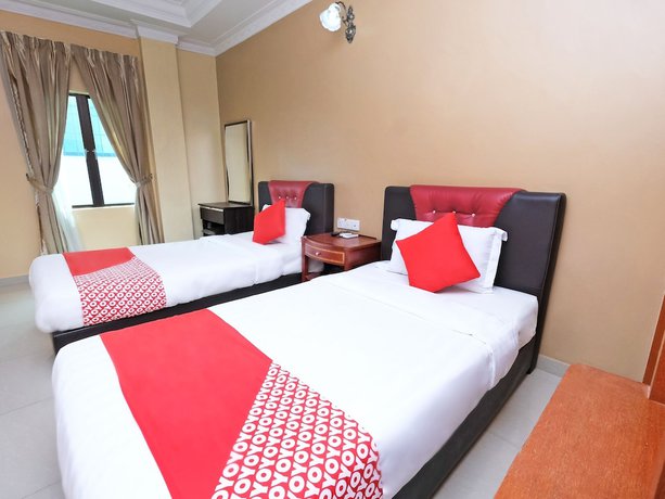 Imagen de la habitación del Hotel Super OYO 707 Ayuni. Foto 8