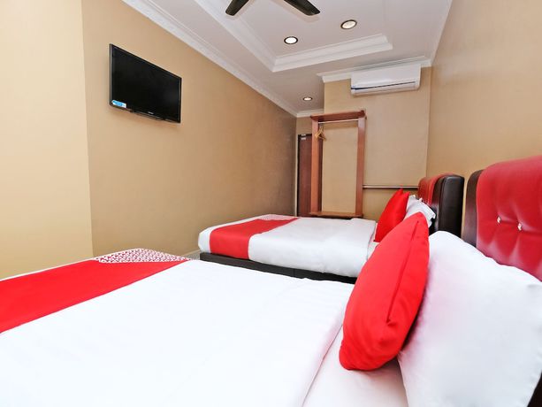 Imagen de la habitación del Hotel Super OYO 707 Ayuni. Foto 9