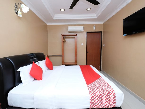 Imagen de la habitación del Hotel Super OYO 707 Ayuni. Foto 11
