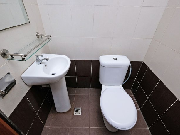 Imagen de la habitación del Hotel Super OYO 707 Ayuni. Foto 12