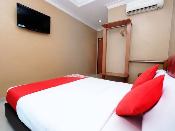 Imagen de la habitación del Hotel Super OYO 707 Ayuni. Foto 13