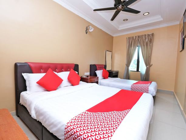 Imagen de la habitación del Hotel Super OYO 707 Ayuni. Foto 15
