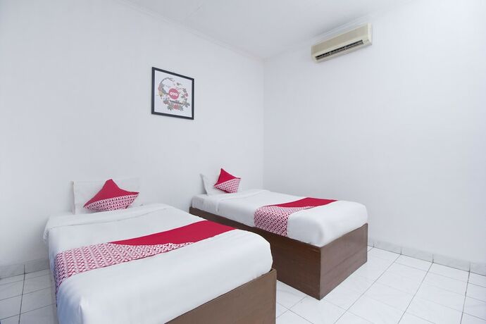 Imagen de la habitación del Hotel Super OYO 759 Dewi Sri. Foto 19