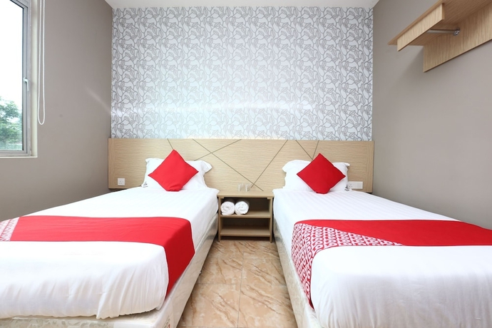Imagen de la habitación del Hotel Super OYO 89771 Dane and Shue. Foto 14