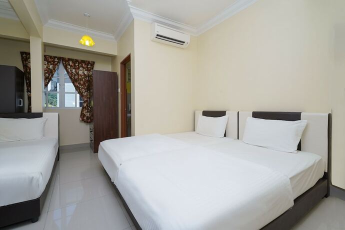 Imagen de la habitación del Hotel Super OYO 90009 Bangi Sri Minang Guesthouse. Foto 11