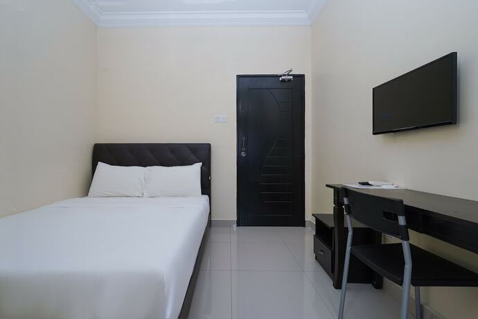 Imagen de la habitación del Hotel Super OYO 90009 Bangi Sri Minang Guesthouse. Foto 13