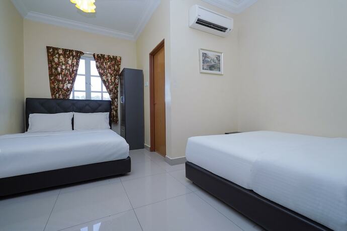 Imagen de la habitación del Hotel Super OYO 90009 Bangi Sri Minang Guesthouse. Foto 14
