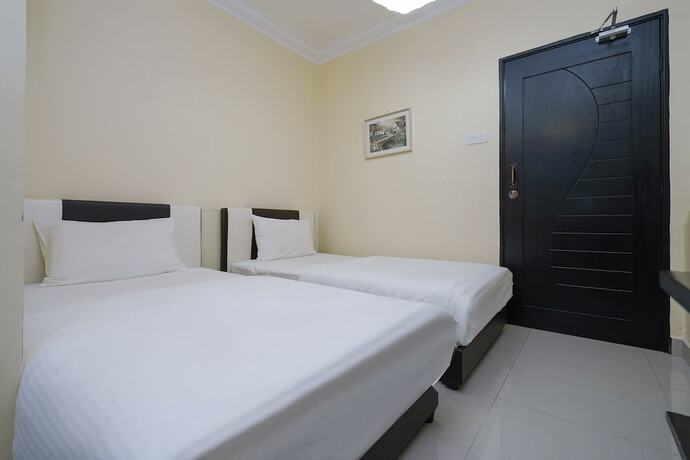 Imagen de la habitación del Hotel Super OYO 90009 Bangi Sri Minang Guesthouse. Foto 16