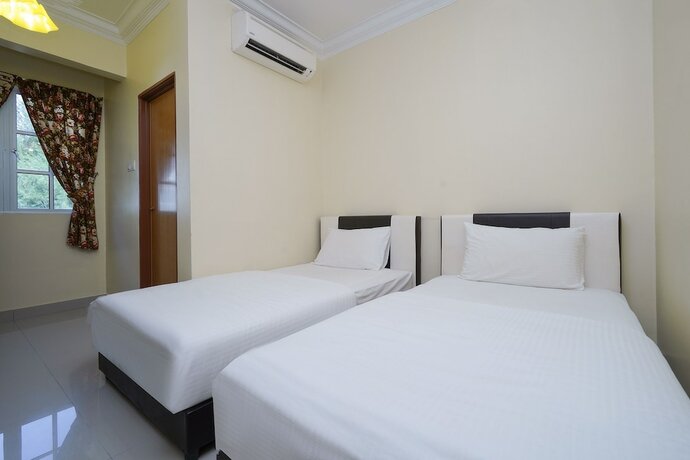 Imagen de la habitación del Hotel Super OYO 90009 Bangi Sri Minang Guesthouse. Foto 17