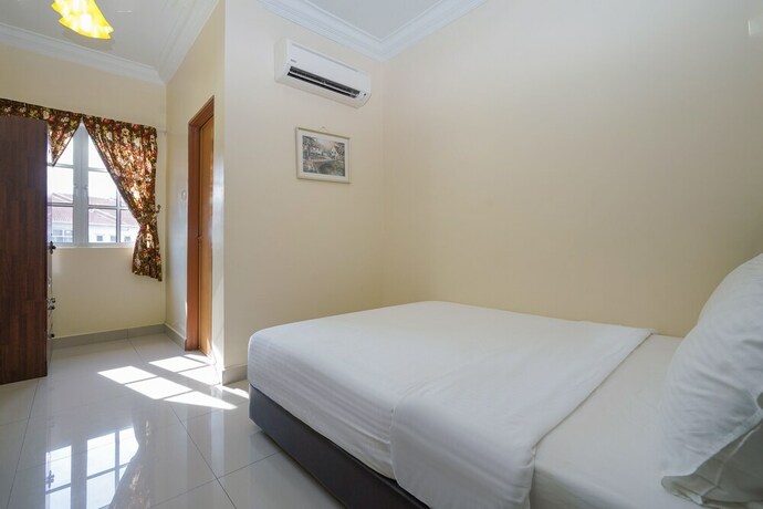 Imagen de la habitación del Hotel Super OYO 90009 Bangi Sri Minang Guesthouse. Foto 19