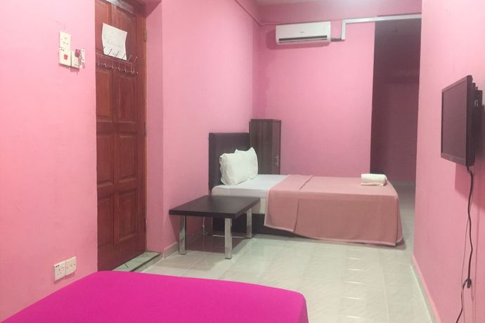 Imagen de la habitación del Hotel Super OYO 90039 Coop Hotel Kangar. Foto 1