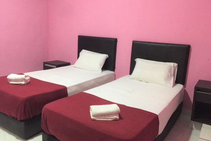 Imagen de la habitación del Hotel Super OYO 90039 Coop Hotel Kangar. Foto 3